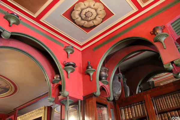 Library ceiling arches with shelves for antique ceramic collection at Sir John Soane's Museum. London, United Kingdom.