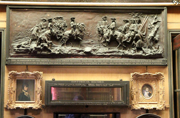 Model for bas relief 'The surrender of French after Battle of Blenheim' (c1730-2) by John Michael Rysbrack over Napoleonic items in Breakfast Room at Sir John Soane's Museum. London, United Kingdom.