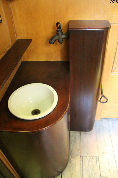 Water pump & basin along hall at Sir John Soane's Museum. London, United Kingdom.