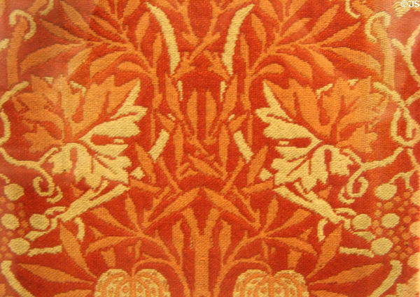 Vine & Pomegranate woven wool (c1877) by William Morris or Kate Faulkner at Morris Gallery. London, United Kingdom.