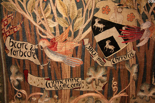 Detail of embroidered wall hanging (c1900) by Morris & Co with needlework by client at Morris Gallery. London, United Kingdom.