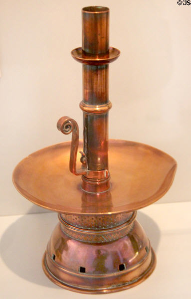 Red House in Bexleyheath (William & Jane Morris' first home) brass & copper candlestick early (1860s) by Philip Webb at Morris Gallery. London, United Kingdom.