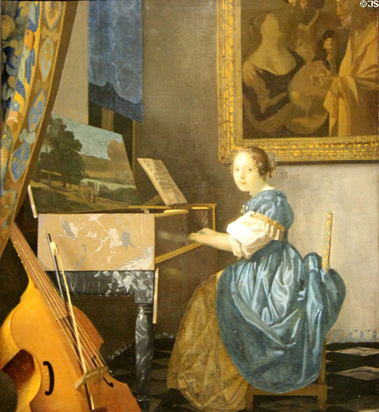 Young Woman seated at a Virginal painting (c1670-2) by Johannes Vermeer at National Gallery. London, United Kingdom.