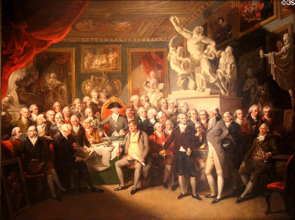 Assembled members of the Royal Academy with president Benjamin West sitting in red chair painting (1795) by Henry Singleton at Royal Academy of Arts. London, United Kingdom.