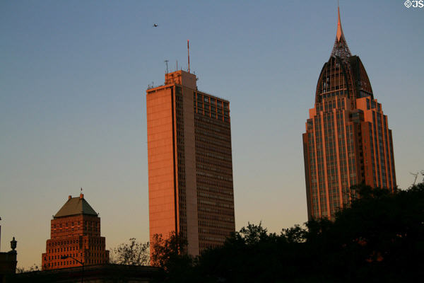 Merchants National Bank, AmSouth Bank, & RSA Battle House Towers reflect sunset. Mobile, AL.