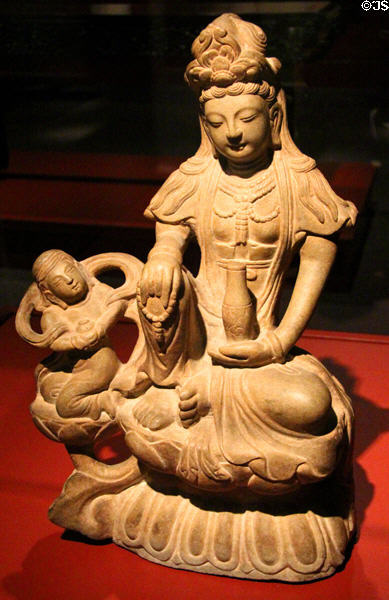 Quan Yin (goddess of mercy) sandstone statue Qing Dynasty (17-18th C) at Mobile Museum of Art. Mobile, AL.