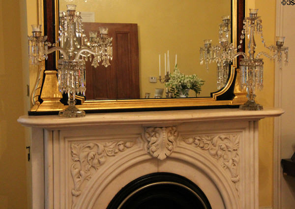 Parlor fireplace mantle with candelabras at Bragg-Mitchell Mansion. Mobile, AL.
