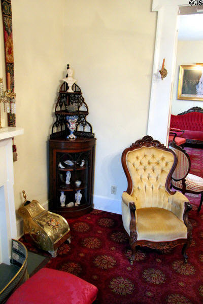 Corner étagère & armchair at Conde-Charlotte Museum. Mobile, AL.