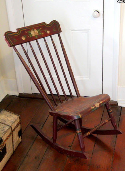 Rocking chair with painted design at Conde-Charlotte Museum. Mobile, AL.