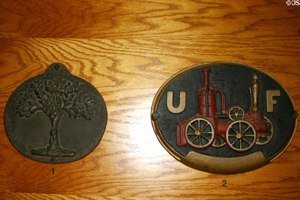 Plaques used to identify subscription to various private fire services in Hall of Flame. Phoenix, AZ.