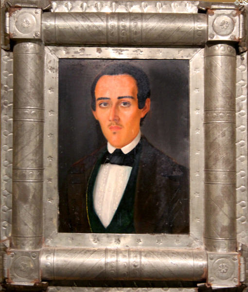 Portrait of man in tin frame from Mexico (19thC) at Tucson Museum of Art. Tucson, AZ.