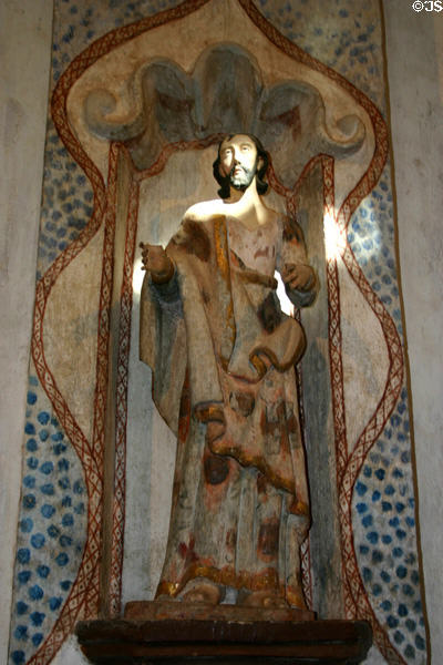 Statue of saint in San Xavier del Bac Mission Church. Tucson, AZ.