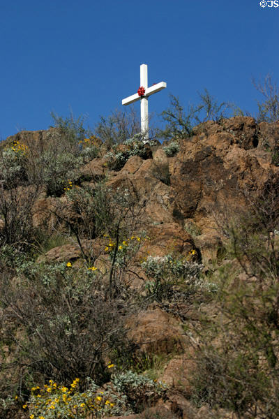 Cross beside San Xavier del Bac Mission Church. Tucson, AZ.