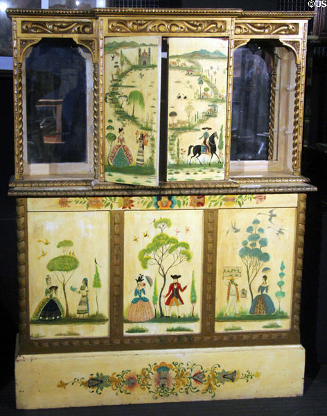 Cabinet painted with Mexican village scenes by Salvador Corona at Arizona History Museum. Tucson, AZ.