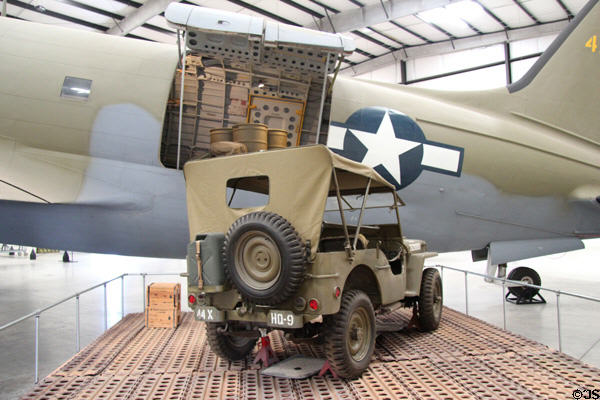 Ford GPW Jeep (1942) beside Curtiss Commando C-46D transport (1942-1960s) at Pima Air & Space Museum. Tucson, AZ.