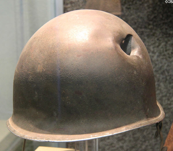 M1 steel helmet with flak hole (WWII) at Pima Air Museum. Tucson, AZ.
