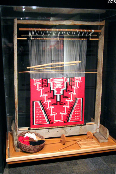 Navajo loom with partially woven Ganado-style rug at Arizona State Museum. Tucson, AZ.