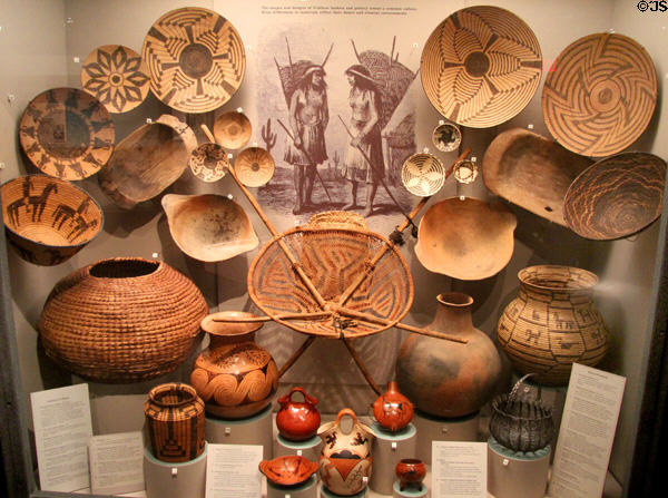 Collection of Akimel O'odham native baskets, wooden bowls & ceramic jars (early 20thC) at Arizona State Museum. Tucson, AZ.