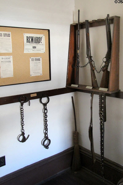 Former sheriff's office rifles & hand cuffs at Tombstone Courthouse Museum. Tombstone, AZ.