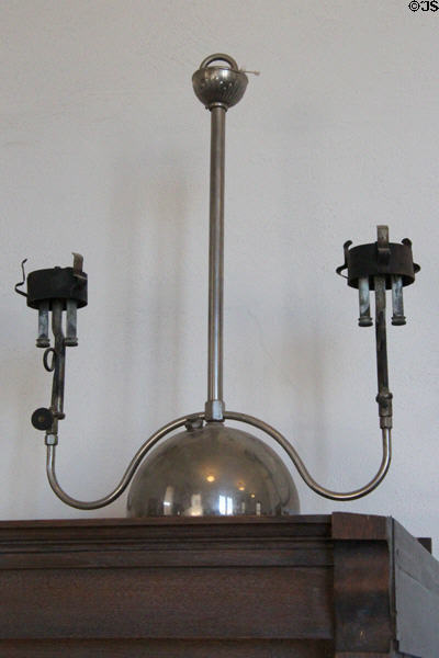 Hanging gas lamp with pressure tank at Tombstone Courthouse Museum. Tombstone, AZ.