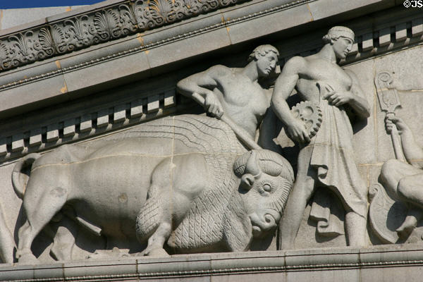 Detail of buffalo & figure of industry on pediment of Jesse Unruh State Office Building. Sacramento, CA.
