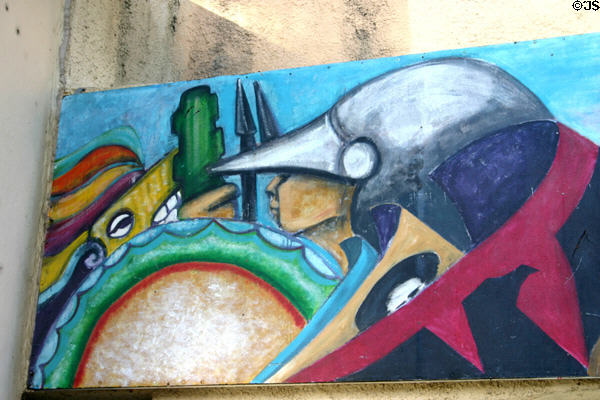 Detail of conquistador vs. natives on mural on El Centro Chicano at Stanford University. Palo Alto, CA.
