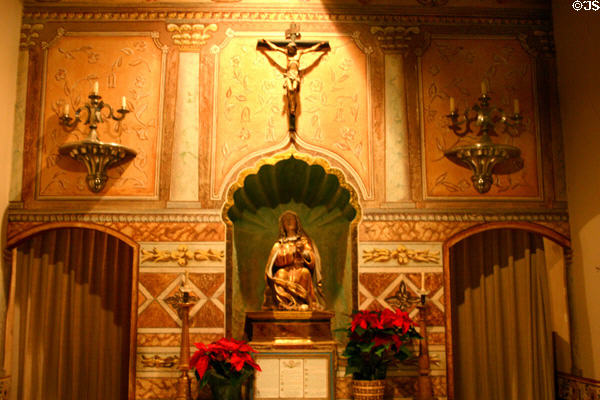 Polychromed altar (17thC) of Madonna Chapel in Santa Ines Mission. Solvang, CA.