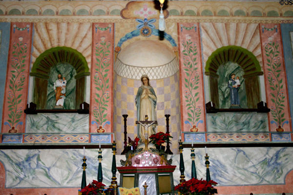High Altar detail & frescos of La Purisima Mission church. Lompoc, CA.