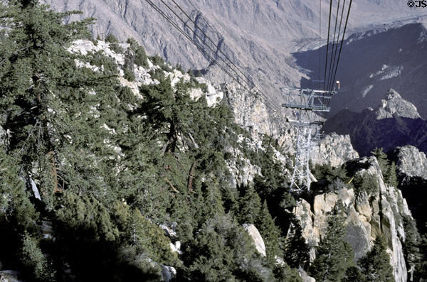 Aerial Tramway climbs to San Jacinto State Park on peak above. CA.