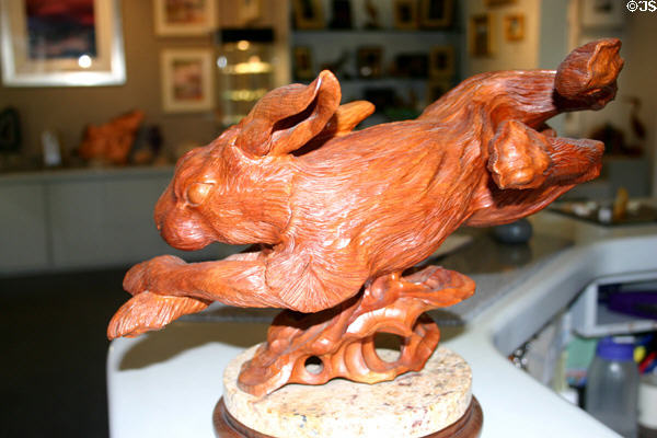Carving of a running rabbit in shop. Monterey, CA.