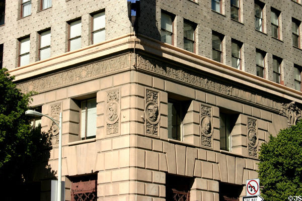 Row of carved California figures on Washington Mutual Building. Los Angeles, CA.
