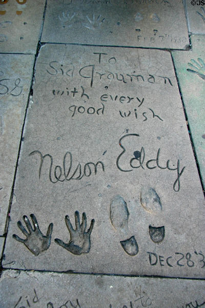 Nelson Eddy hands & shoe prints in concrete at Mann's Chinese Theatre. Hollywood, CA.