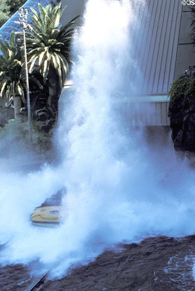 Jurassic Park ride ends with a plunge down a waterfall soaking visitors at Universal Studios. Universal City, CA.