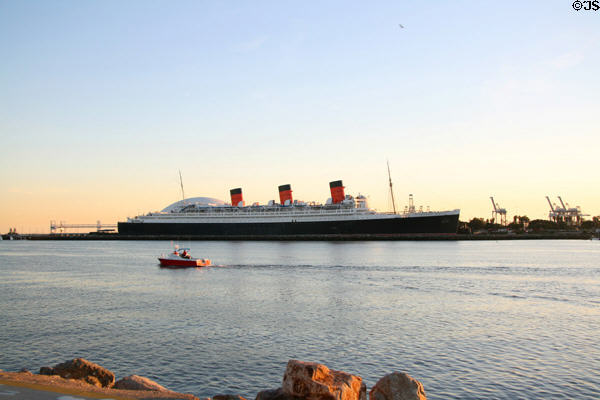 Queen Mary in profile from Long Beach park. Long Beach, CA.