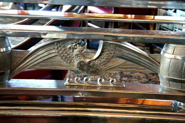Art Deco flying eagle on railing of Promenade Deck Observation Bar of Queen Mary. Long Beach, CA.