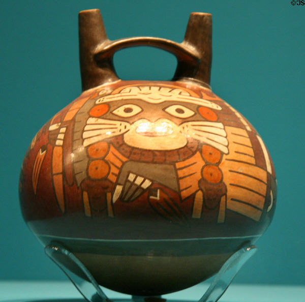 Nazca / Chimu ceramic double spout & bridge bottle (900-1430) from Peru at Fowler Museum. Los Angeles, CA.