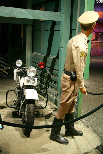 Harley-Davidson (1932) motorcycle with highway patrolman display at Petersen Automotive Museum. Los Angeles, CA.