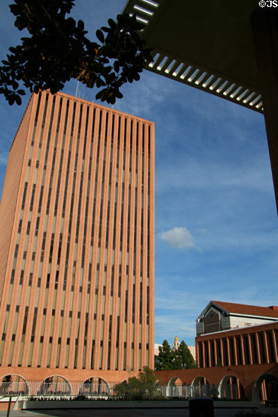 Waite Phillips Hall framed by roofline of Von Kleinsmid Center at USC. Los Angeles, CA.