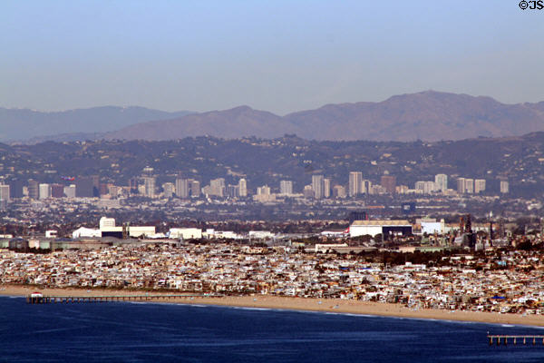 Manhattan Beach Pier, with Los Angeles International Airport, Wilshire Blvd. & San Gabriel Mountains beyond. Los Angeles, CA.