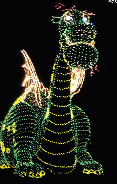 Nighttime lighted float of green dragon at Disneyland ®. Anaheim, CA.