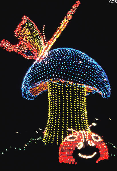 Nighttime lighted float of butterfly on mushroom at Disneyland ®. Anaheim, CA.