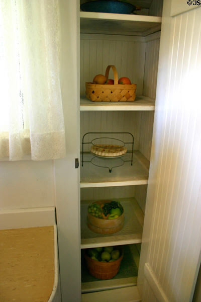 California cooler cupboard in kitchen of Nixon Birthplace where cool air from basement came up through screen shelves. Yorba Linda, CA.