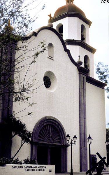 New Mission Catholic Church outside historic Mission San Juan Capistrano admission area. Capistrano, CA.