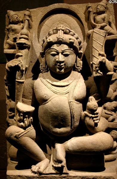 India: Kubera god of wealth (11th c) of sculpted sandstone from Uttar or Madhya Pradesh, Norton Simon Museum. Pasadena, CA.