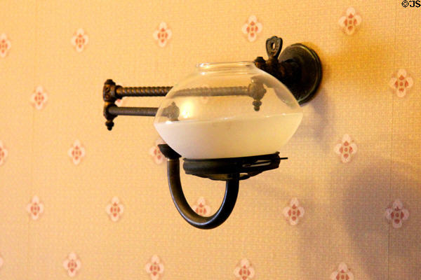 Gas lamp wall fixture at Davis House Museum. San Diego, CA.