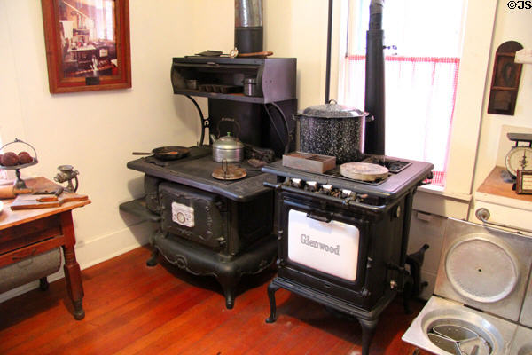 Wood & gas stoves in kitchen at Davis House Museum. San Diego, CA.