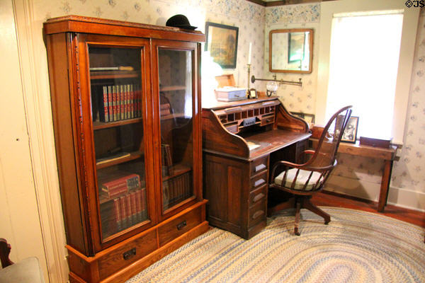 Office with bookcase & roll top desk at Davis House Museum. San Diego, CA.