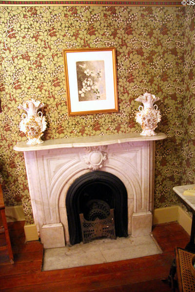 Bedroom fireplace at Davis House Museum. San Diego, CA.