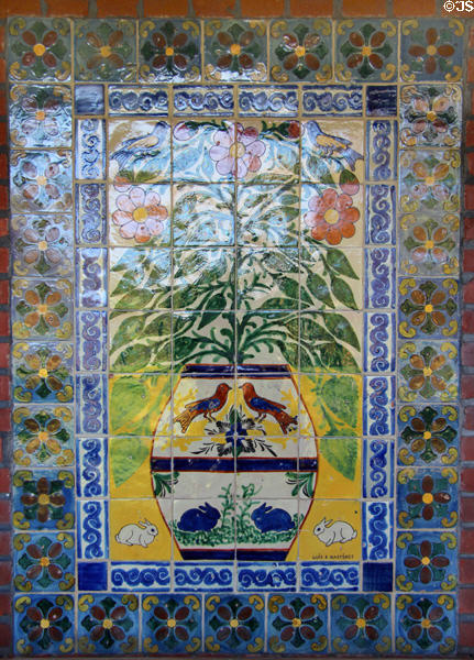 Marston House Museum arts & crafts tile mural detail with flowers in vase with rabbits & birds. San Diego, CA.