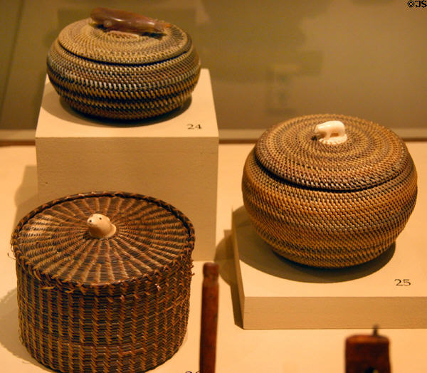 Inuit baskets with carved animal handles (early 20thC) from Alaska at San Diego Museum of Man. San Diego, CA.
